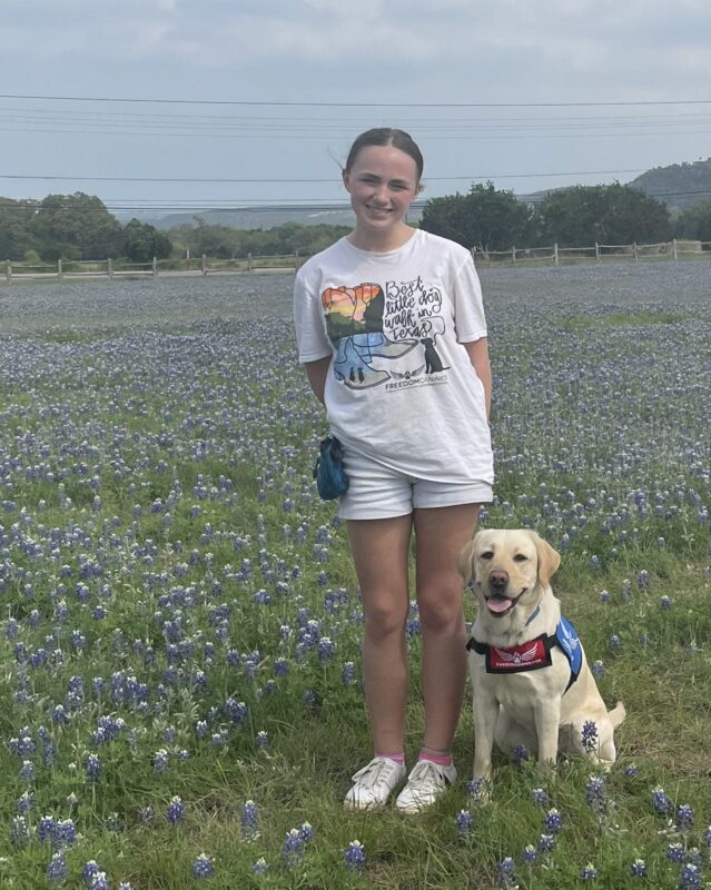 It is bluebonnet season here so our club got together to take pictures in the bluebonnets. Gabby is pictured with one of our student volunteers.